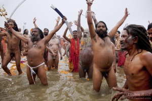 Maha Kumbh Mela. Sangam. Naga Sadhus. Worship. Ganges. Royal Bath. Sword.